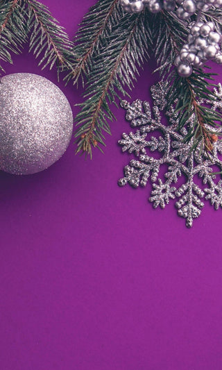 Background image in purple with tree and snowflake